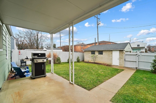 view of yard with a patio and an outdoor structure