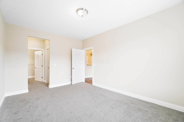 unfurnished bedroom with carpet flooring