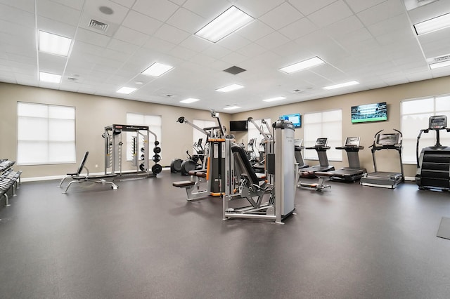 exercise room with a drop ceiling