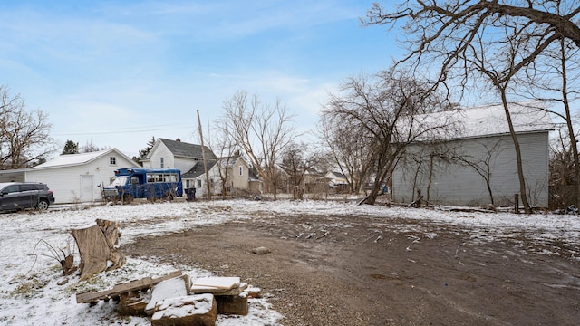 view of yard covered in snow