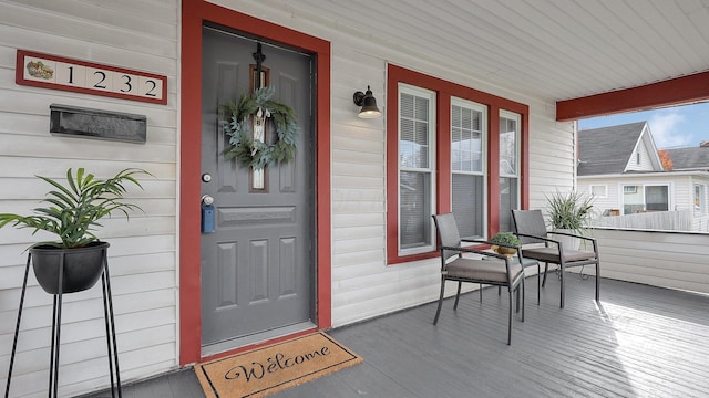 entrance to property with a porch