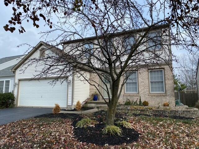 view of home's exterior with a garage