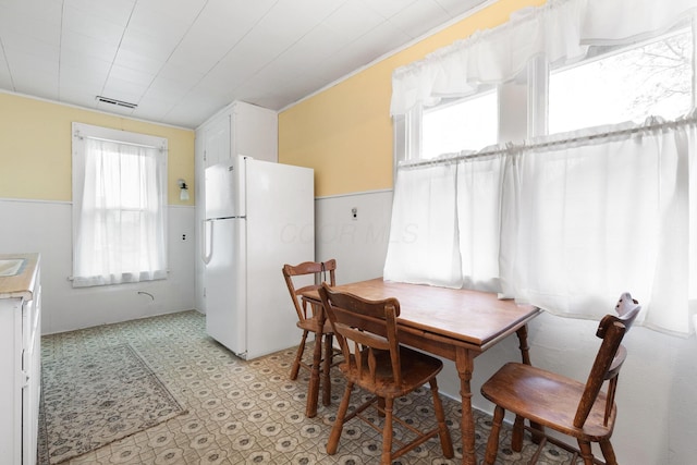 dining room with ornamental molding