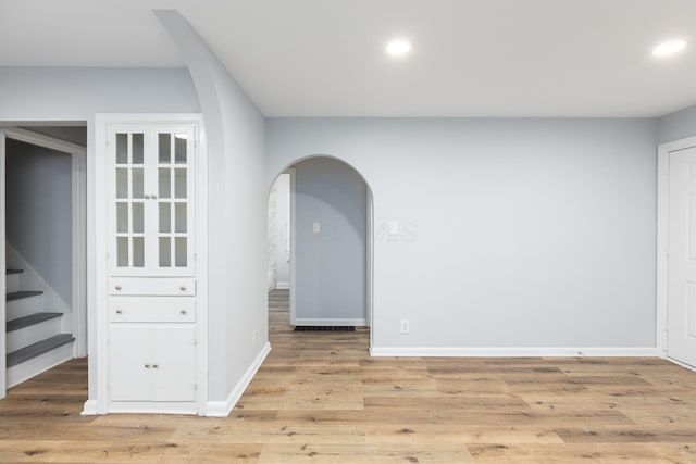 unfurnished room featuring light hardwood / wood-style flooring