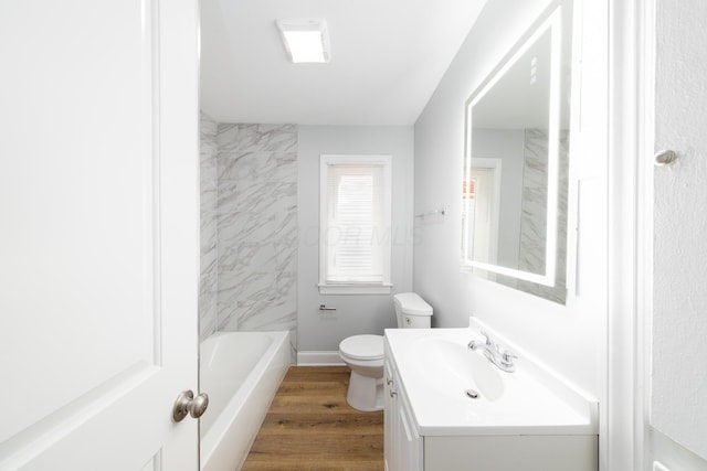 bathroom featuring hardwood / wood-style floors, vanity, and toilet