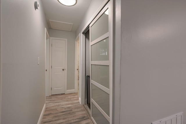 hallway featuring light hardwood / wood-style floors