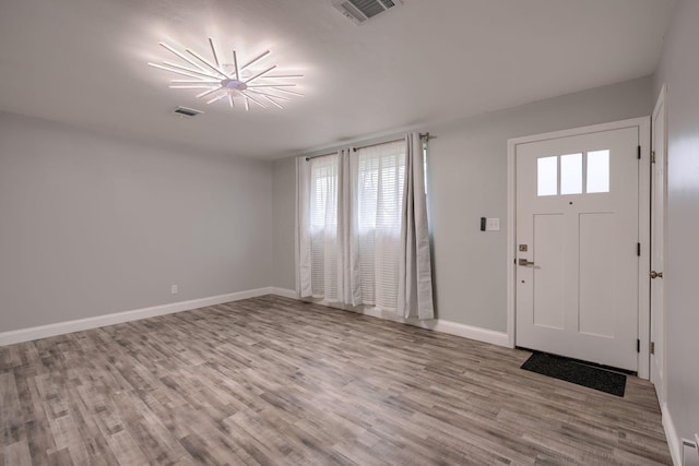 entrance foyer featuring a healthy amount of sunlight and light wood-type flooring