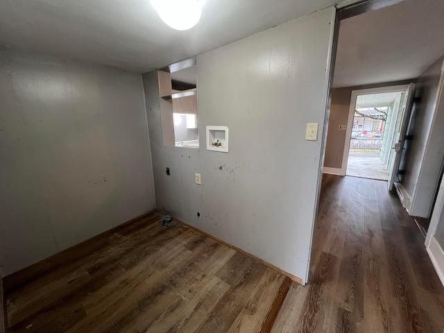 clothes washing area featuring washer hookup, dark hardwood / wood-style flooring, and electric dryer hookup