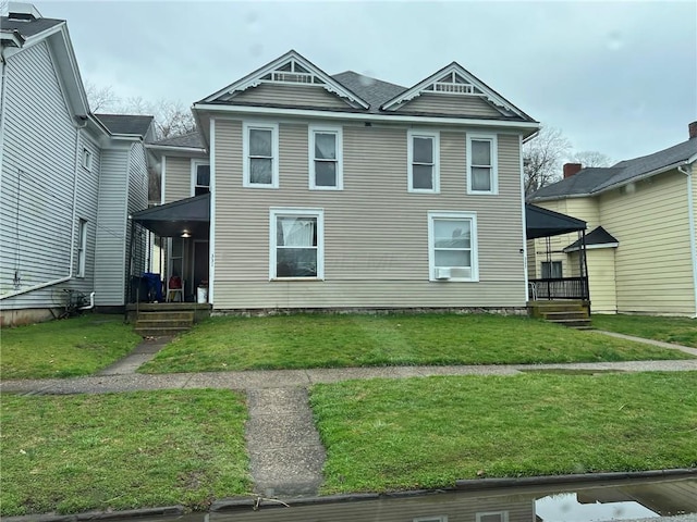 view of front of house with a front lawn