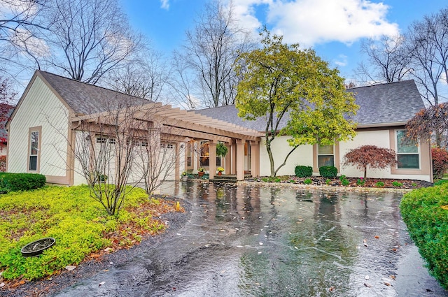 view of front of house featuring a pergola