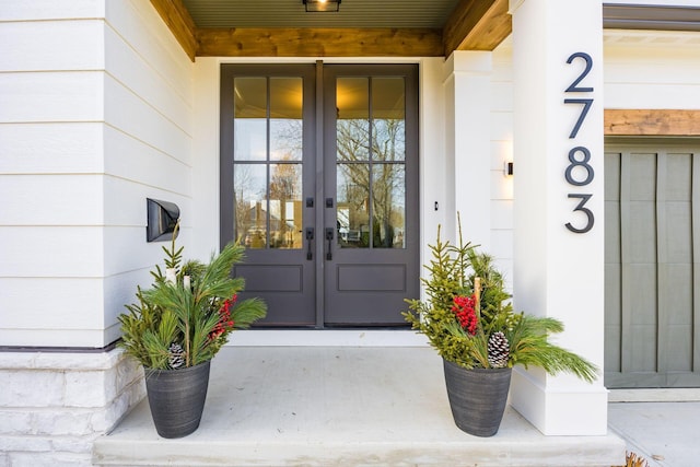 entrance to property featuring french doors