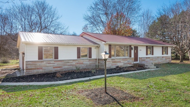 ranch-style house with a front yard