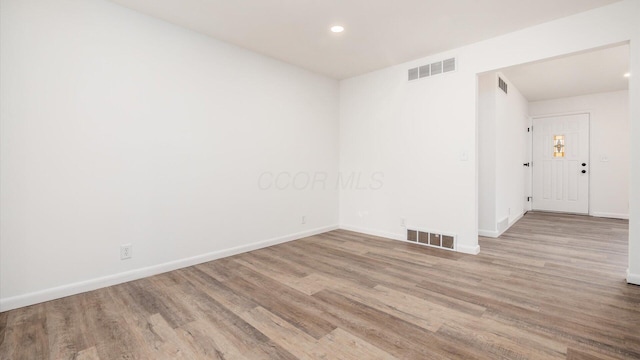 empty room featuring light wood-type flooring