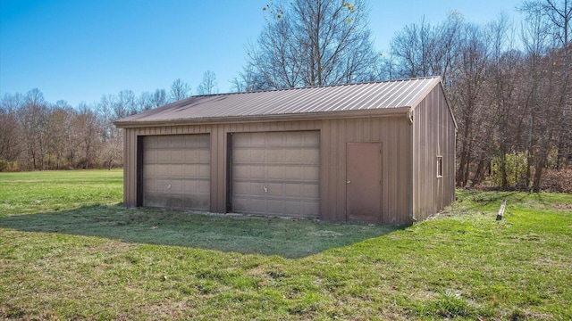 garage with a lawn