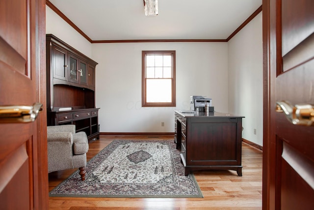 office space featuring ornamental molding and light wood-type flooring