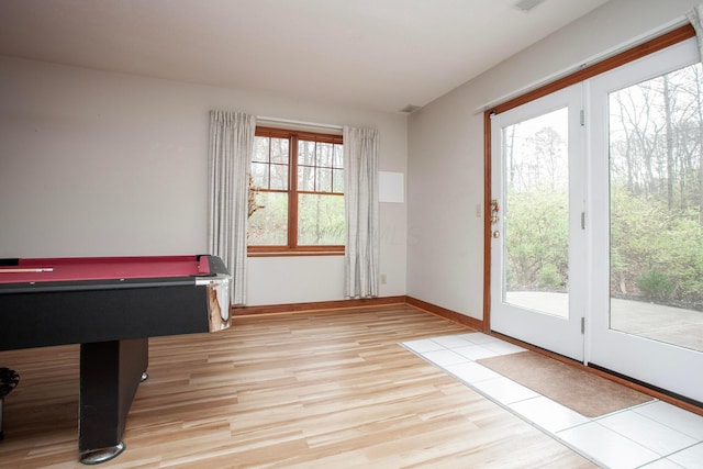 rec room with light hardwood / wood-style flooring and billiards