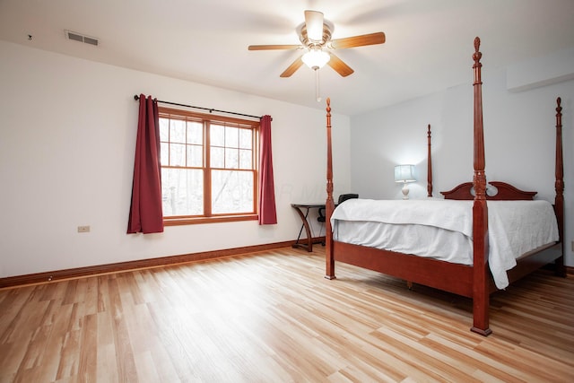 bedroom featuring ceiling fan and light hardwood / wood-style flooring