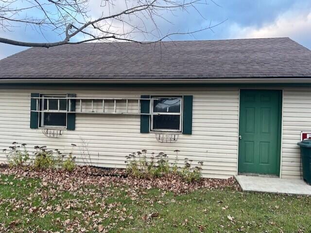 view of home's exterior with a yard