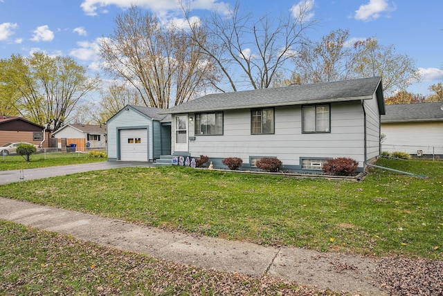 ranch-style home with a front lawn and a garage