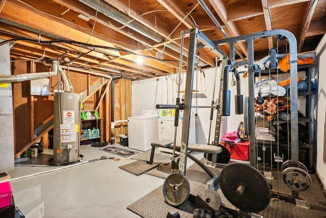 basement featuring water heater and washer and dryer