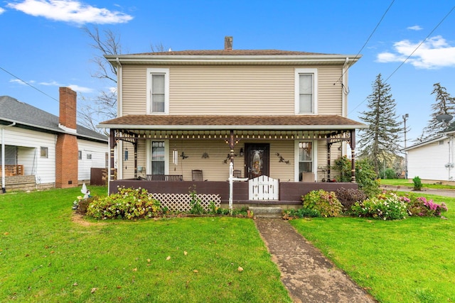 front facade with a porch and a front yard