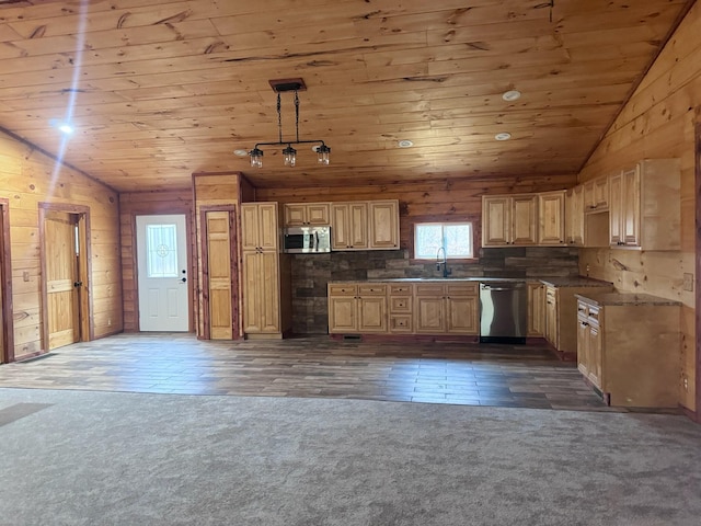 kitchen with wood ceiling, hanging light fixtures, vaulted ceiling, and appliances with stainless steel finishes