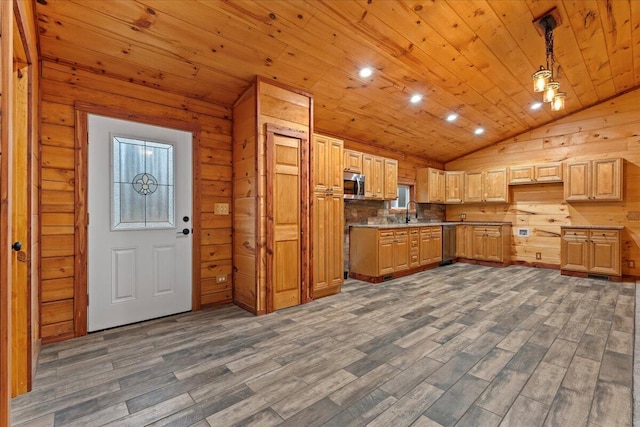 kitchen with wooden ceiling, hanging light fixtures, dark wood-type flooring, lofted ceiling, and wooden walls