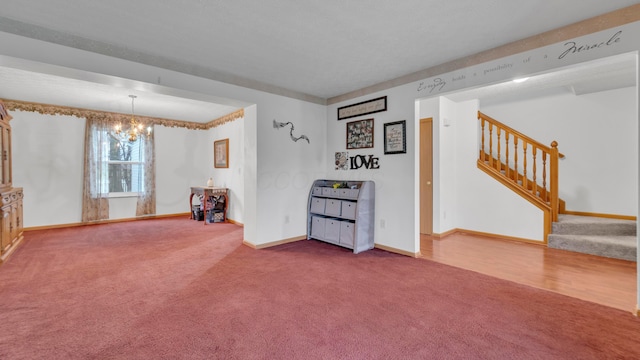 interior space with carpet floors and an inviting chandelier