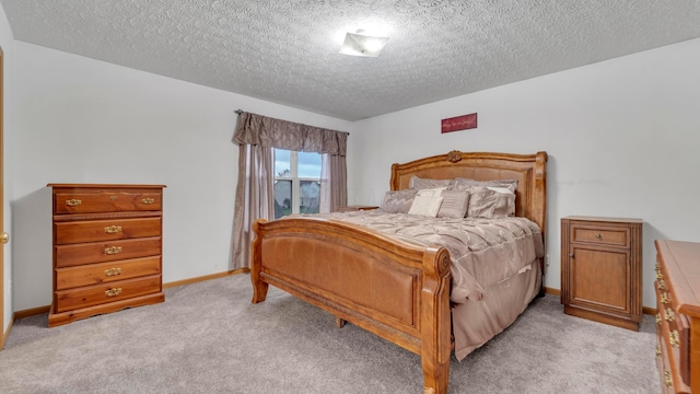 carpeted bedroom with a textured ceiling