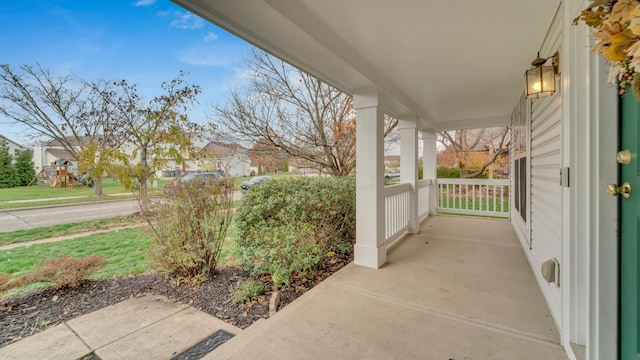 view of patio featuring a porch