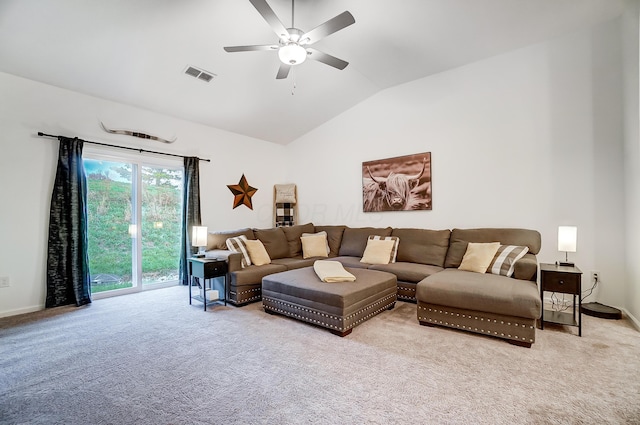 living room with light carpet, ceiling fan, and lofted ceiling