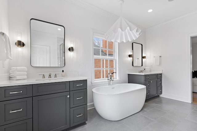 bathroom featuring ornamental molding, plus walk in shower, tile patterned flooring, and vanity