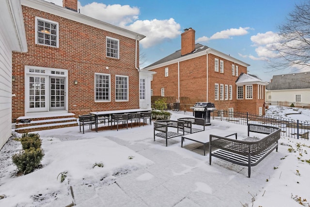 view of snow covered house