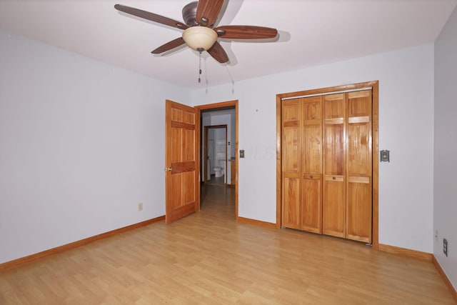 unfurnished bedroom featuring a closet, ceiling fan, and light hardwood / wood-style flooring