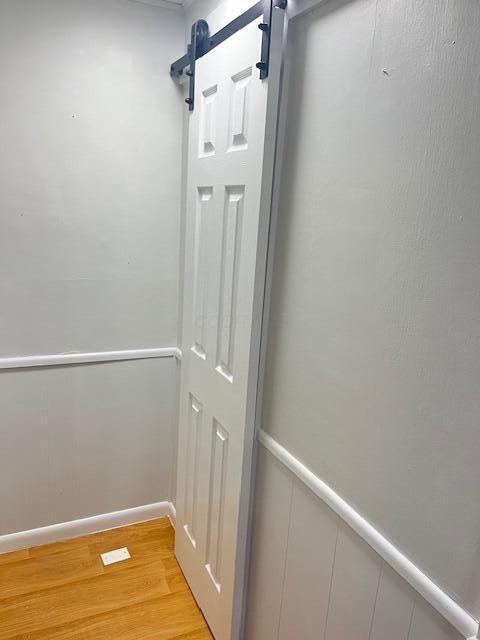 884 Rapp-Montgomery Rd Unit C627, Lucasville, OH 45648 - detailed view of a barn door and wood finished floors