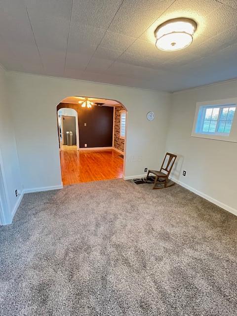 884 Rapp-Montgomery Rd Unit C627, Lucasville, OH 45648 - unfurnished room featuring arched walkways and carpet flooring