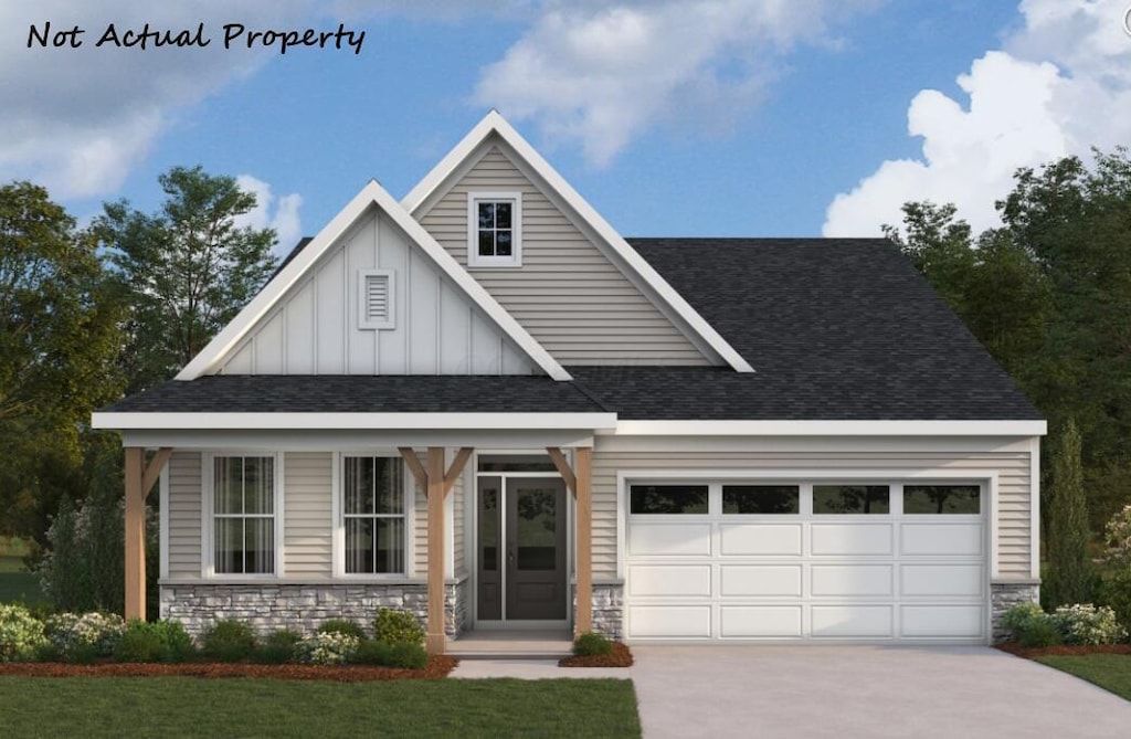 view of front facade with a front lawn and a garage