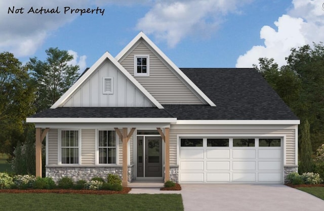 view of front facade with a front lawn and a garage