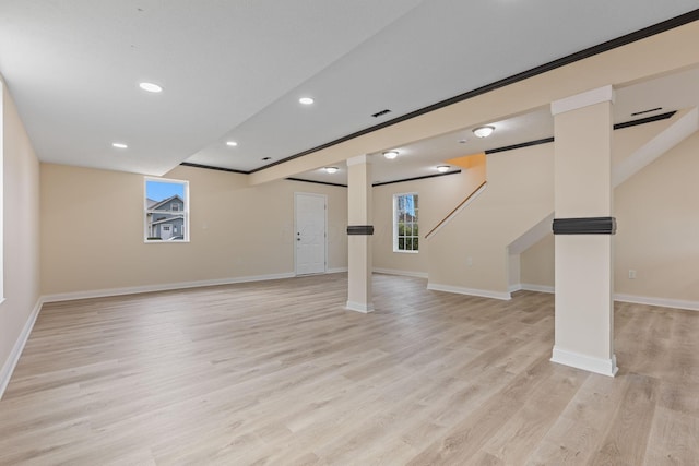 basement featuring light hardwood / wood-style floors