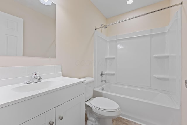 full bathroom featuring tile patterned floors, vanity, toilet, and tub / shower combination