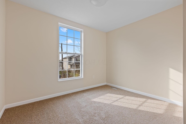 view of carpeted spare room