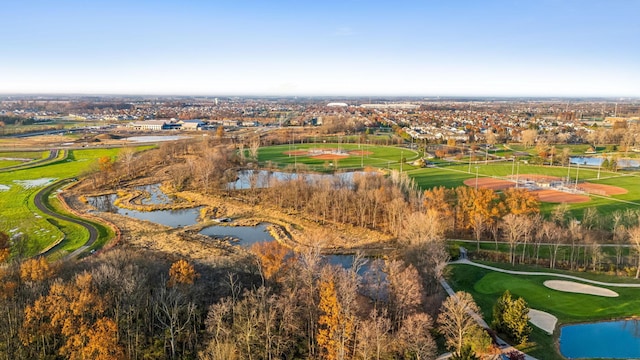 bird's eye view with a water view