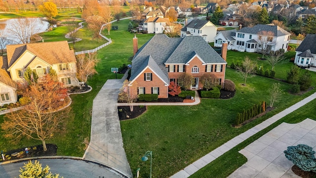 drone / aerial view with a water view