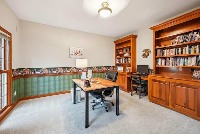 home office with light colored carpet