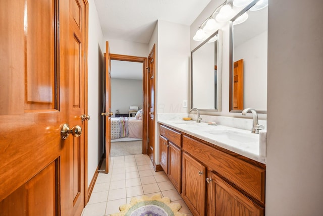 bathroom featuring tile patterned floors and vanity