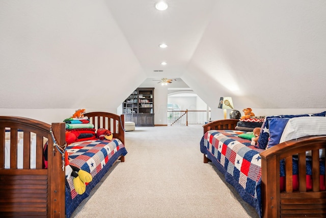 bedroom featuring carpet floors and vaulted ceiling