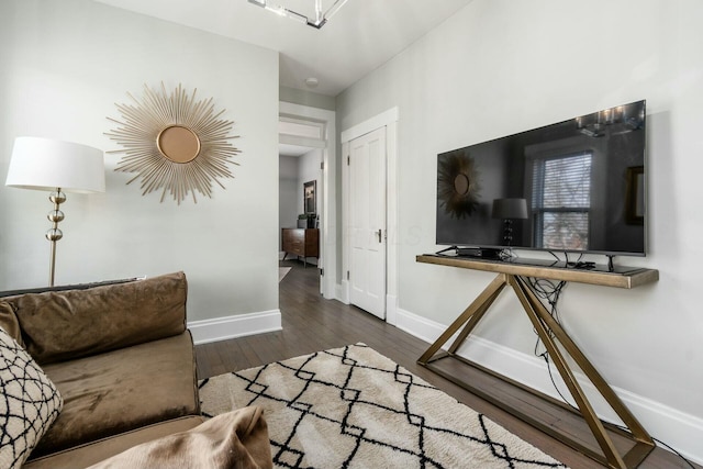 living room with dark hardwood / wood-style floors