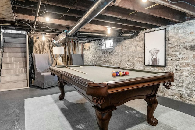 rec room with concrete floors and billiards