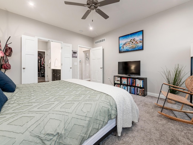 carpeted bedroom featuring ceiling fan