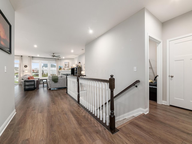 corridor featuring hardwood / wood-style flooring